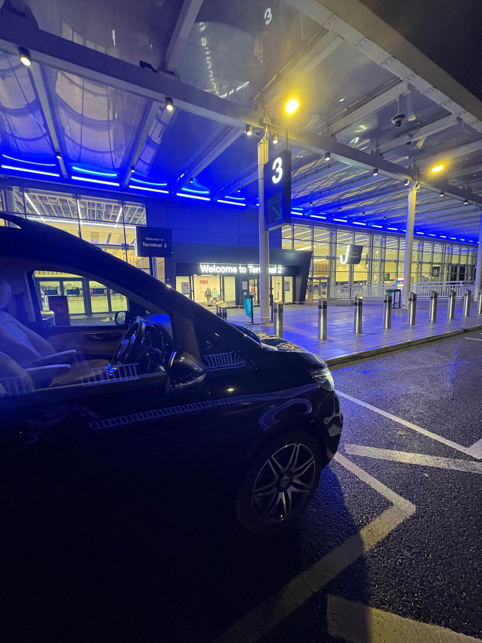 AO Platinum Chauffeurs Mercedes-Benz Jet-Class at Manchester Airport Terminal 2 at night